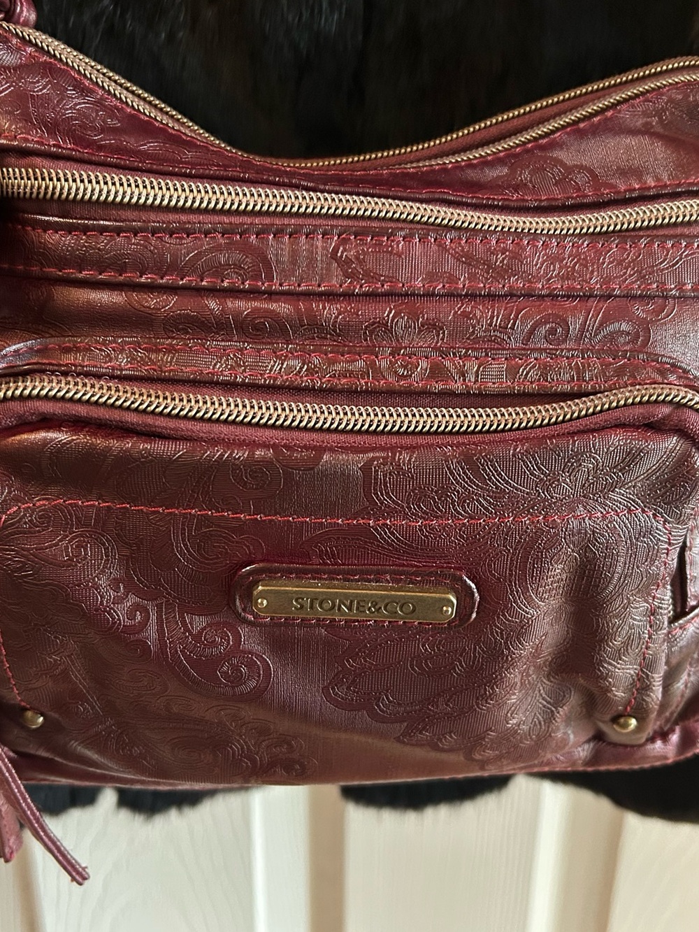 Stone & Co. Vegan Faux Leather Messenger Bag Maroon & Paisley design.
Crossbody